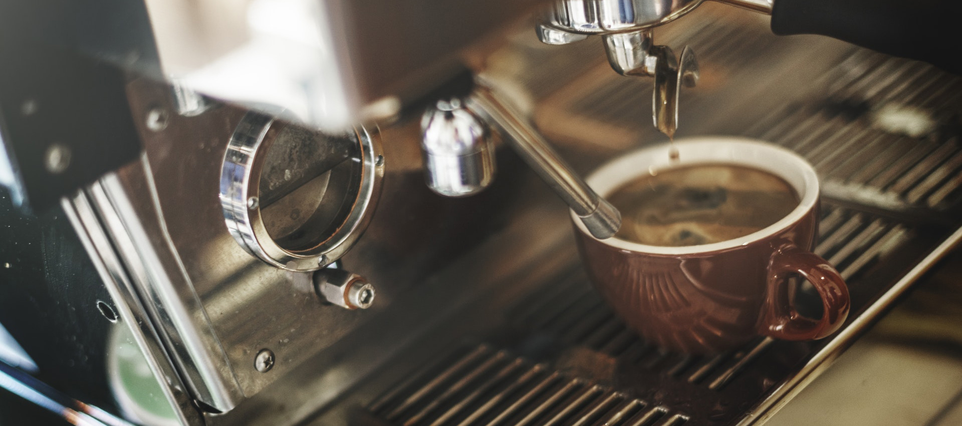 Espresso machine brewing up a cup of coffee.
